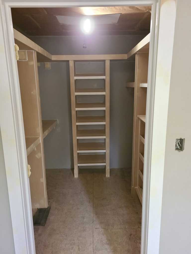 Painting shelf in basement after